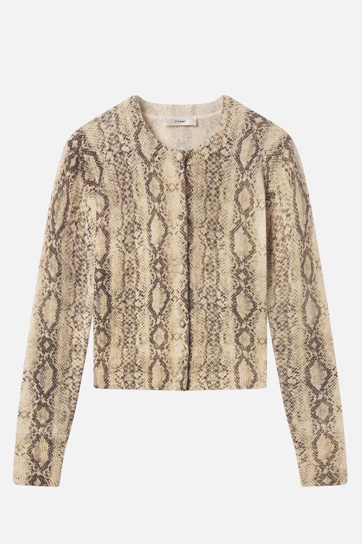 Cashmere cardigan with subtle snake pattern, styled with dark denim