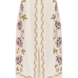 embroidered white midi skirt on white background 