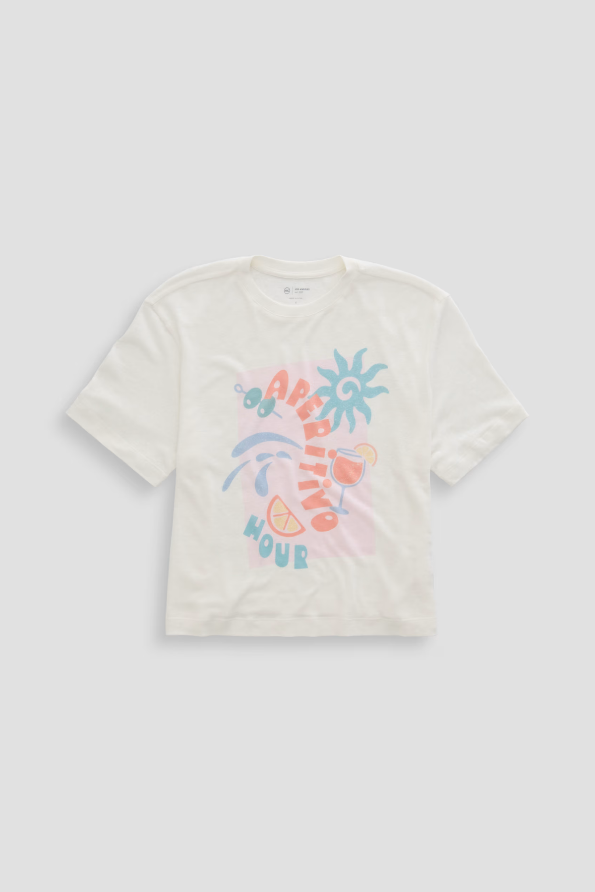 White t-shirt with colorful graphic design on a light gray background
