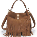 Brown suede handbag with fringe details on a white background