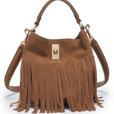 Brown suede handbag with fringe details on a white background