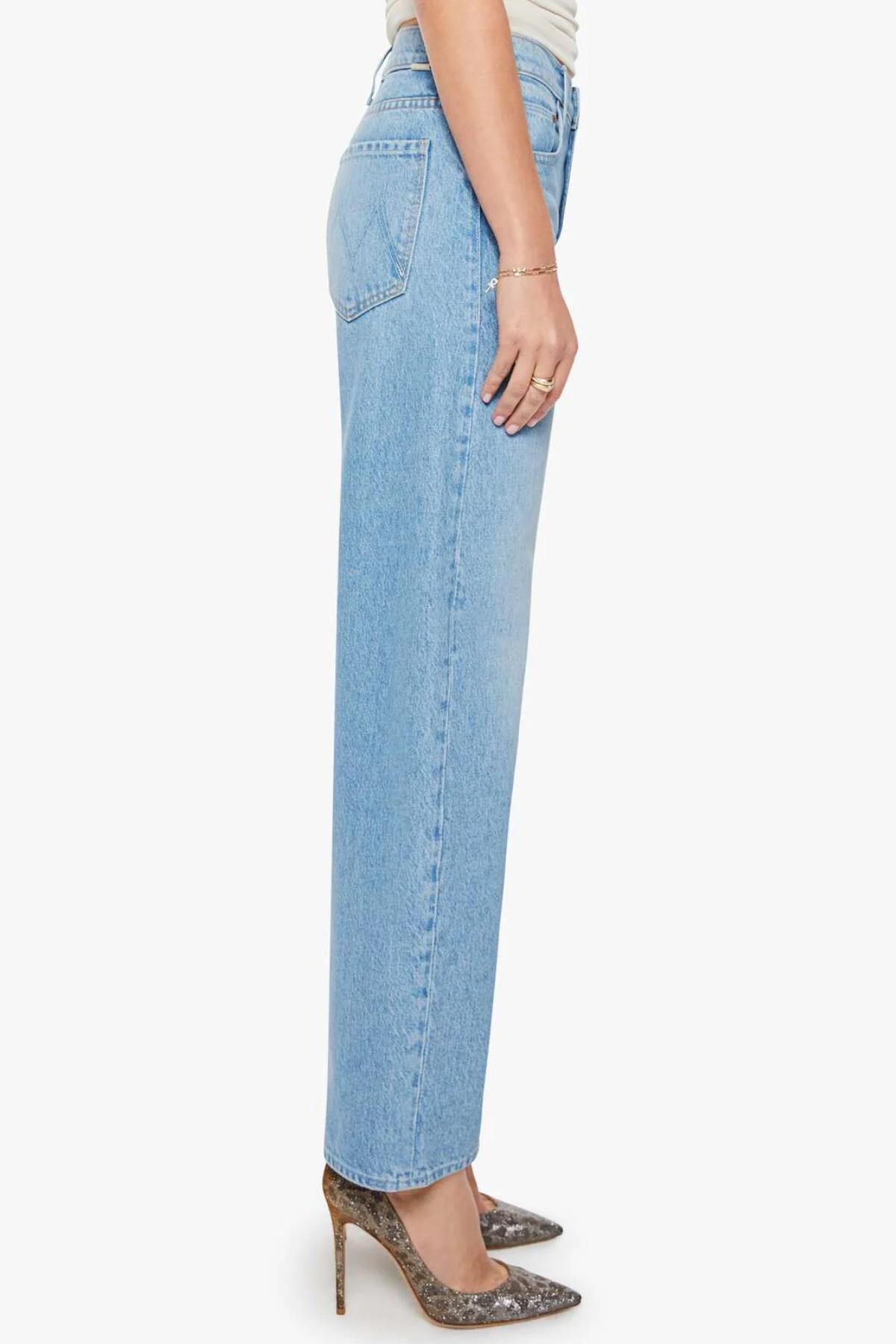Light blue jeans worn by a person on a white background