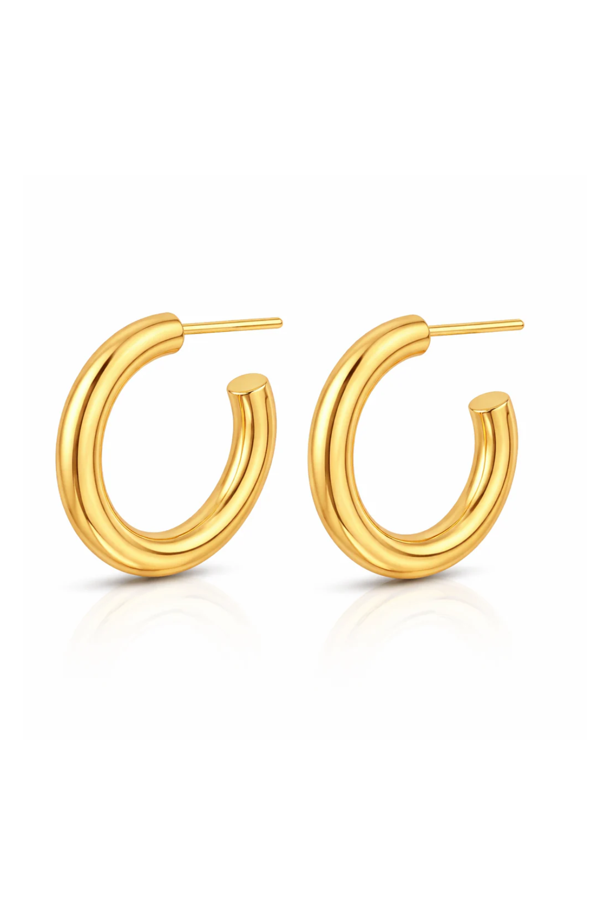 Gold hoop earrings on a white background