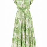 Green and white floral dress on a white background