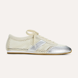 White sneaker with silver accents on a white background