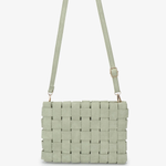 A light sage green woven leather shoulder bag with a matching adjustable shoulder strap and gold-tone hardware, shown against a plain white background.