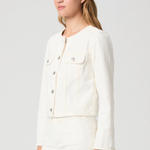 Woman wearing a white jacket on a plain background