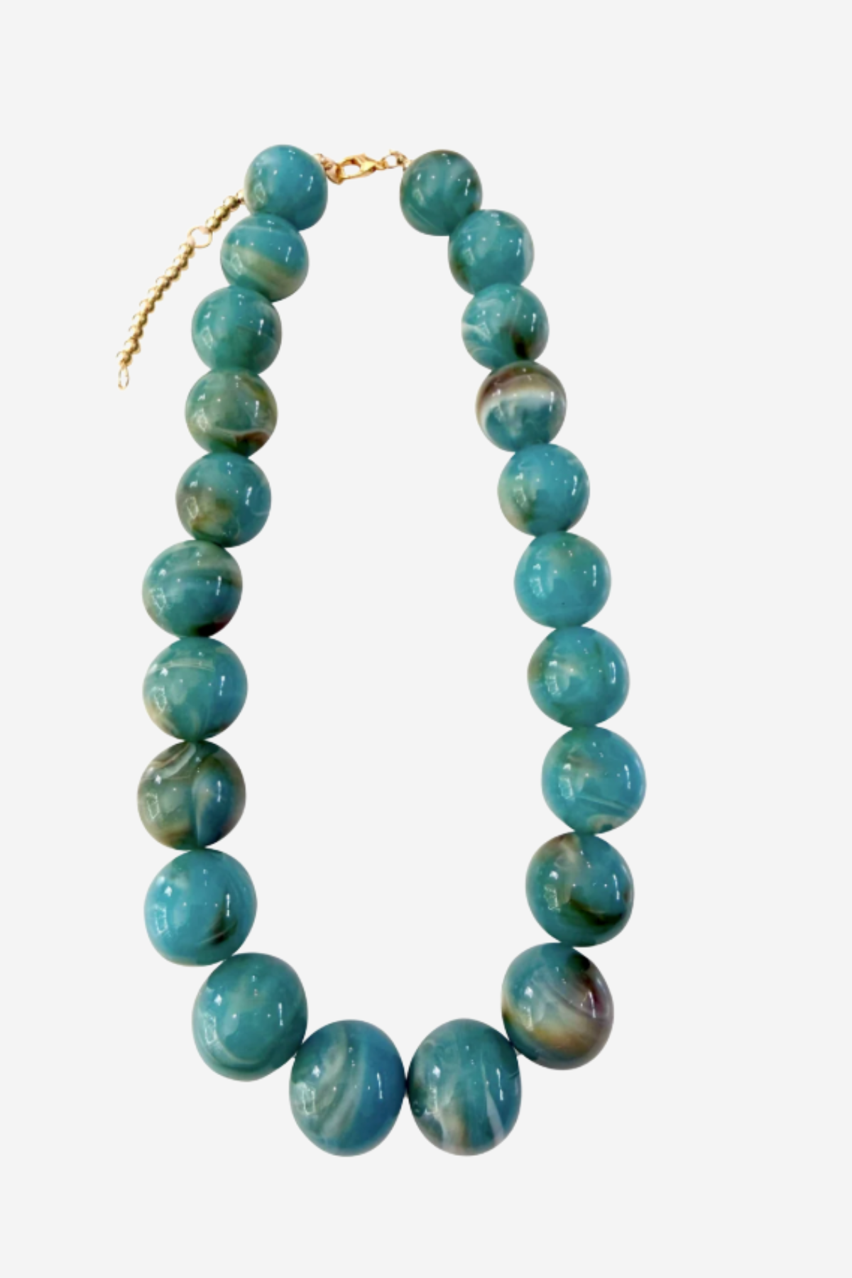 A beaded necklace made of round turquoise-blue marbled beads with a small gold clasp, shown on a plain light gray background.