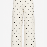 Off-white wide-leg jeans with a black polka dot pattern, shown against a plain white background.