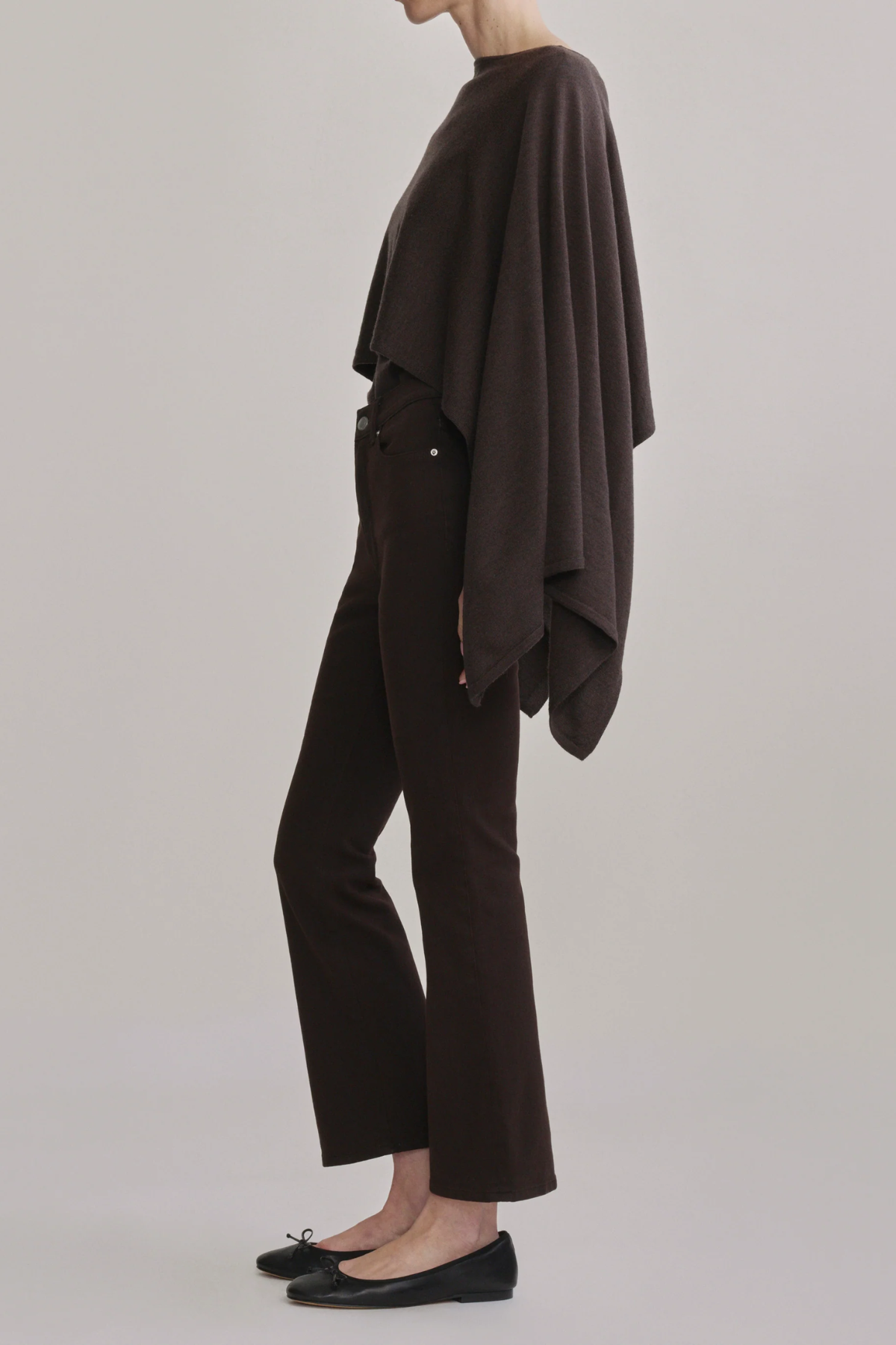 Women's dark-wash high-rise cropped bootcut jeans featuring a streamlined fit through the hip and thigh.