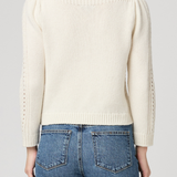 Women's ivory sweater featuring long sleeves, a classic neckline, and relaxed silhouette.