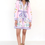 Woman wearing a colorful dress with a white background