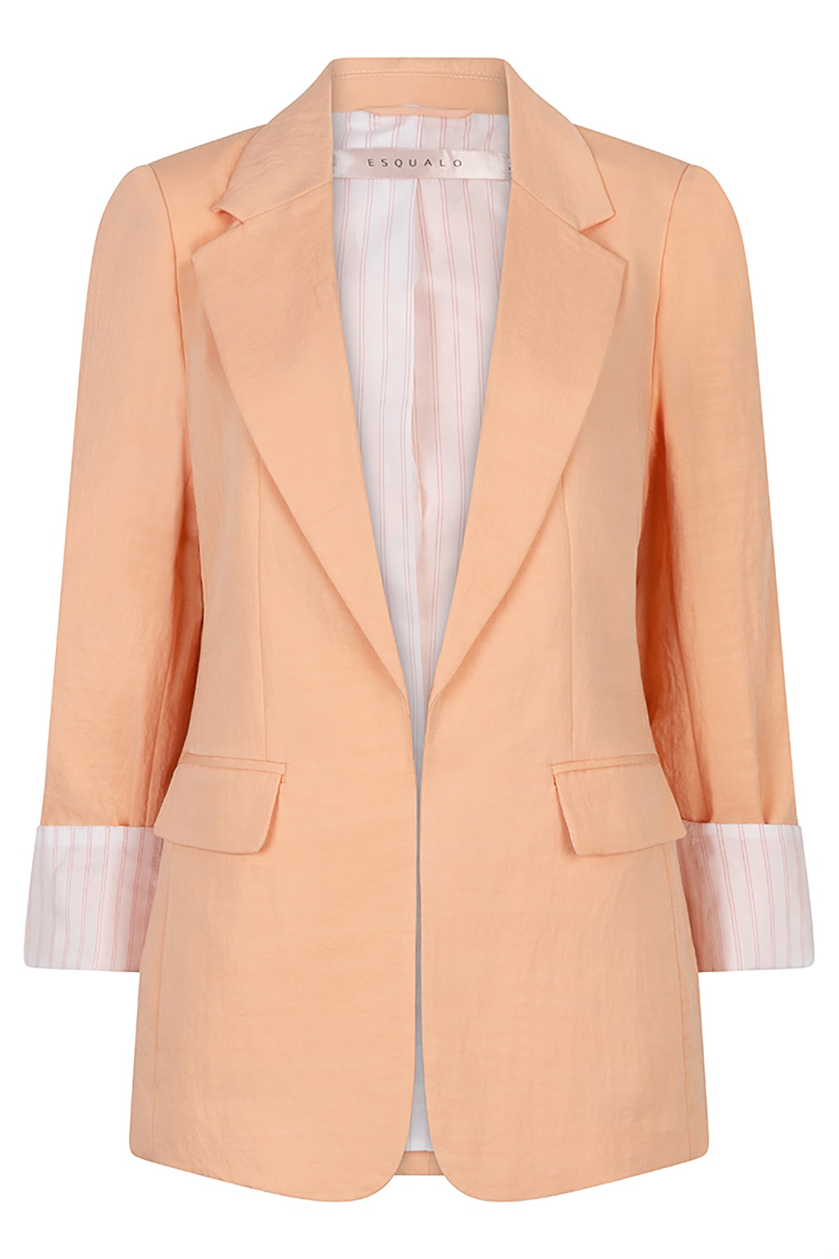 Light peach blazer with white trim on a white background