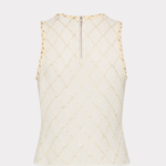 An off-white sleeveless knit top with a subtle gold diamond lattice pattern and a small silver zipper at the neckline, shown against a light gray background.