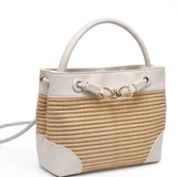 Woven handbag with white accents on a white background