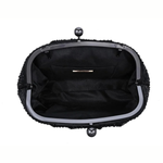 The interior view of a black textured clutch handbag with a black satin lining, a silver-tone metal frame, and pearl-like clasp details on a white background.