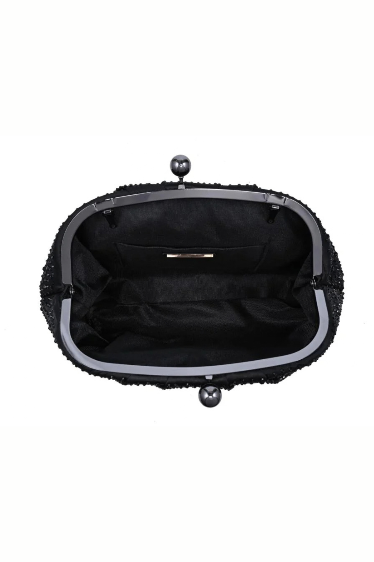 The interior view of a black textured clutch handbag with a black satin lining, a silver-tone metal frame, and pearl-like clasp details on a white background.