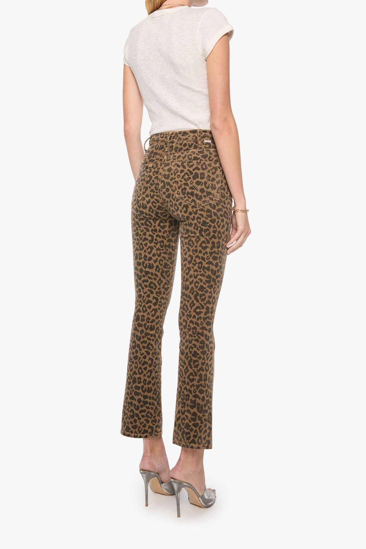 Model wearing high-rise cropped wide-leg leopard print jeans.