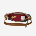 Compact handbag with a structured silhouette and shoulder strap in a timeless, versatile design.