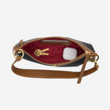 Compact handbag with a structured silhouette and shoulder strap in a timeless, versatile design.