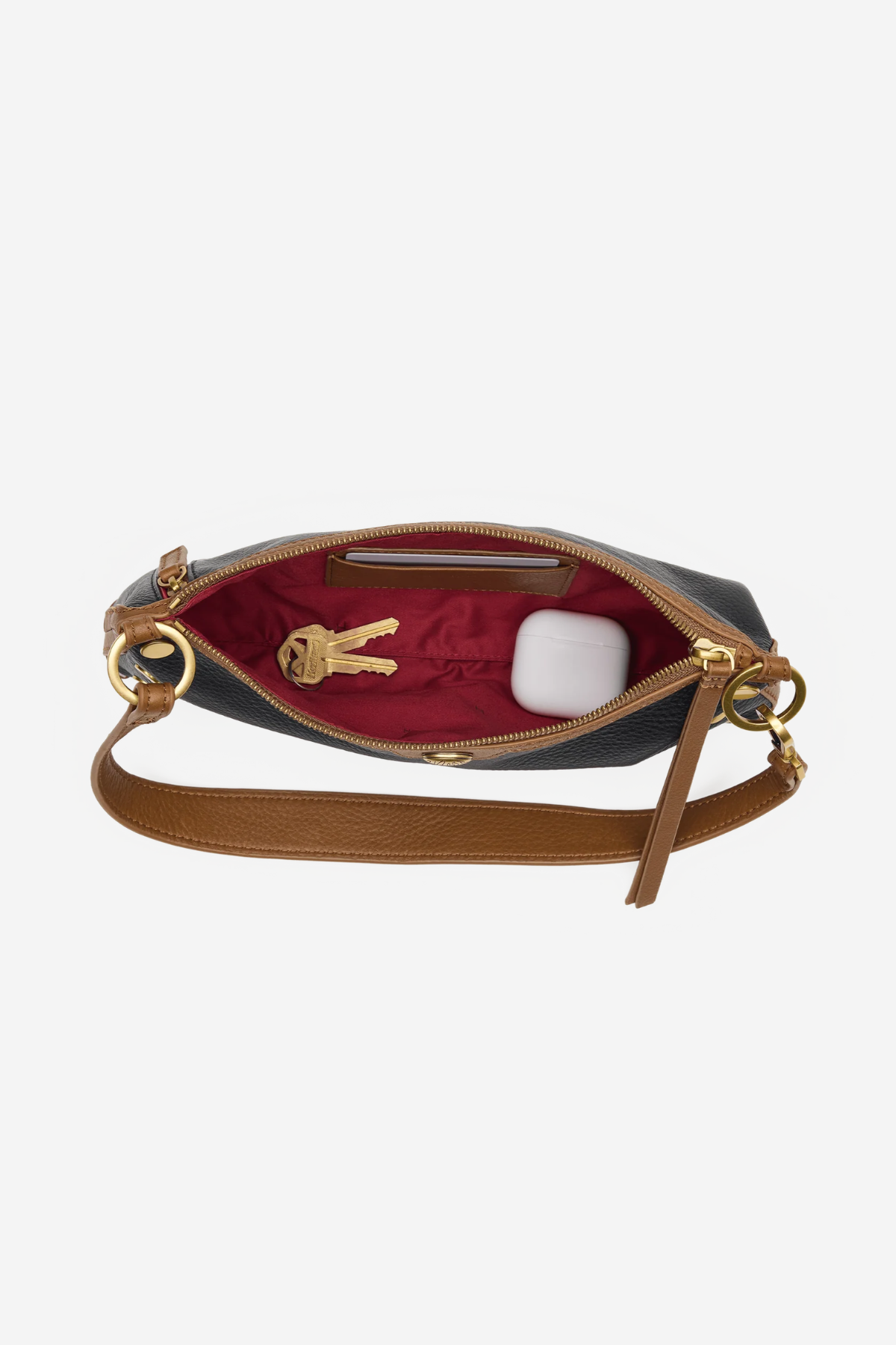 Compact handbag with a structured silhouette and shoulder strap in a timeless, versatile design.