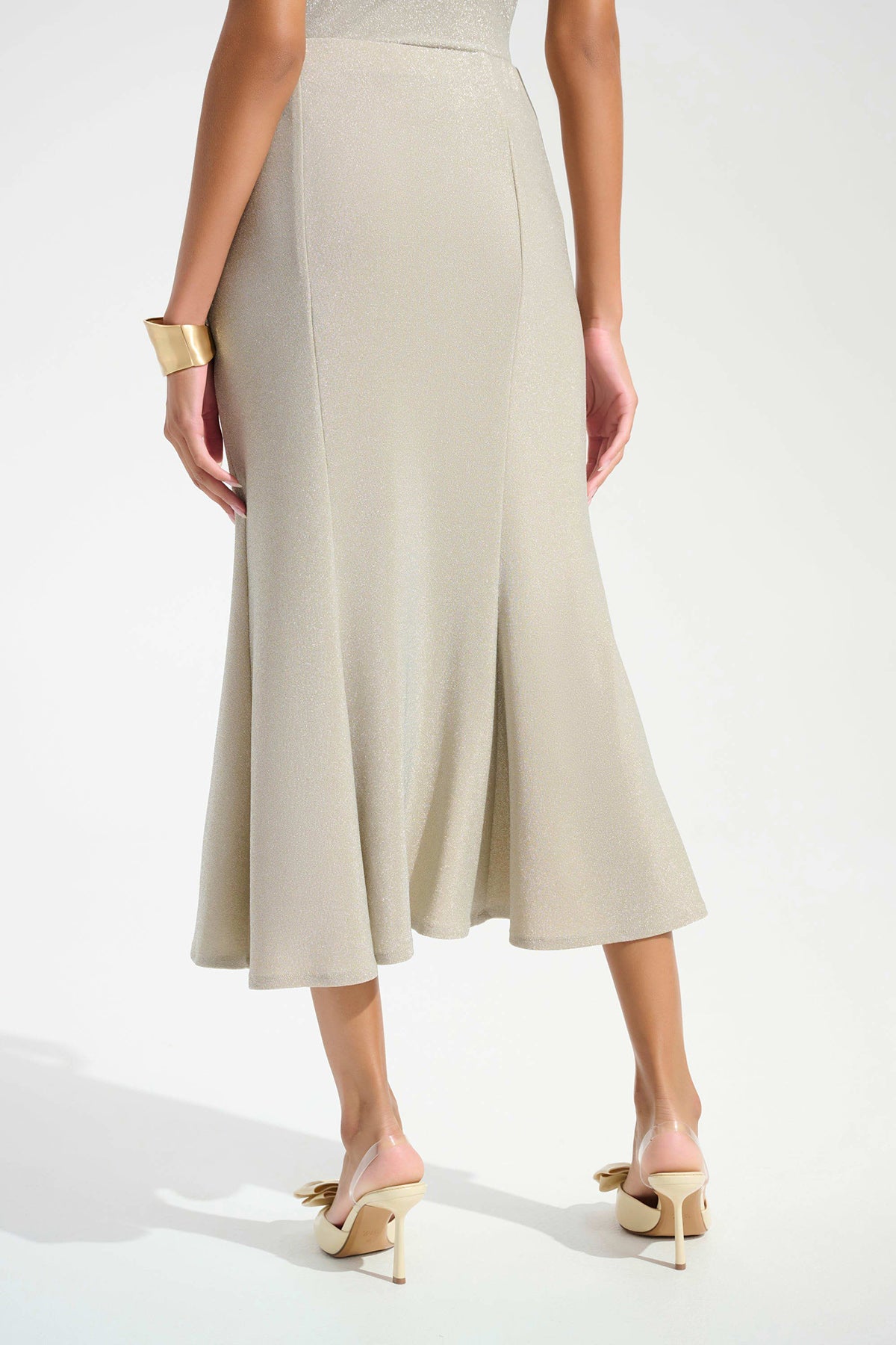 Champagne sparkle knit trumpet skirt with flared hem