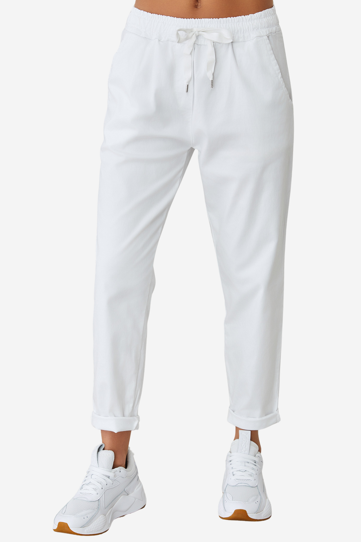 Women's lightweight white jogger pants featuring a drawstring waistband, side pockets, and tapered leg.