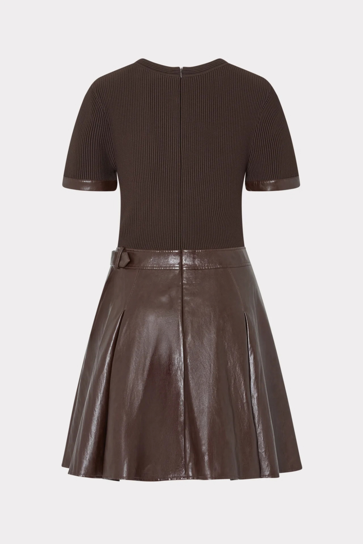 A dark brown two-piece outfit featuring a short-sleeve ribbed knit top and a matching pleated faux-leather skirt, shown against a light gray background.