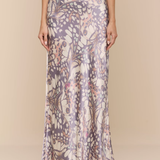 Long floral-patterned dress on a plain background