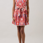 woman in floral dress on white background 