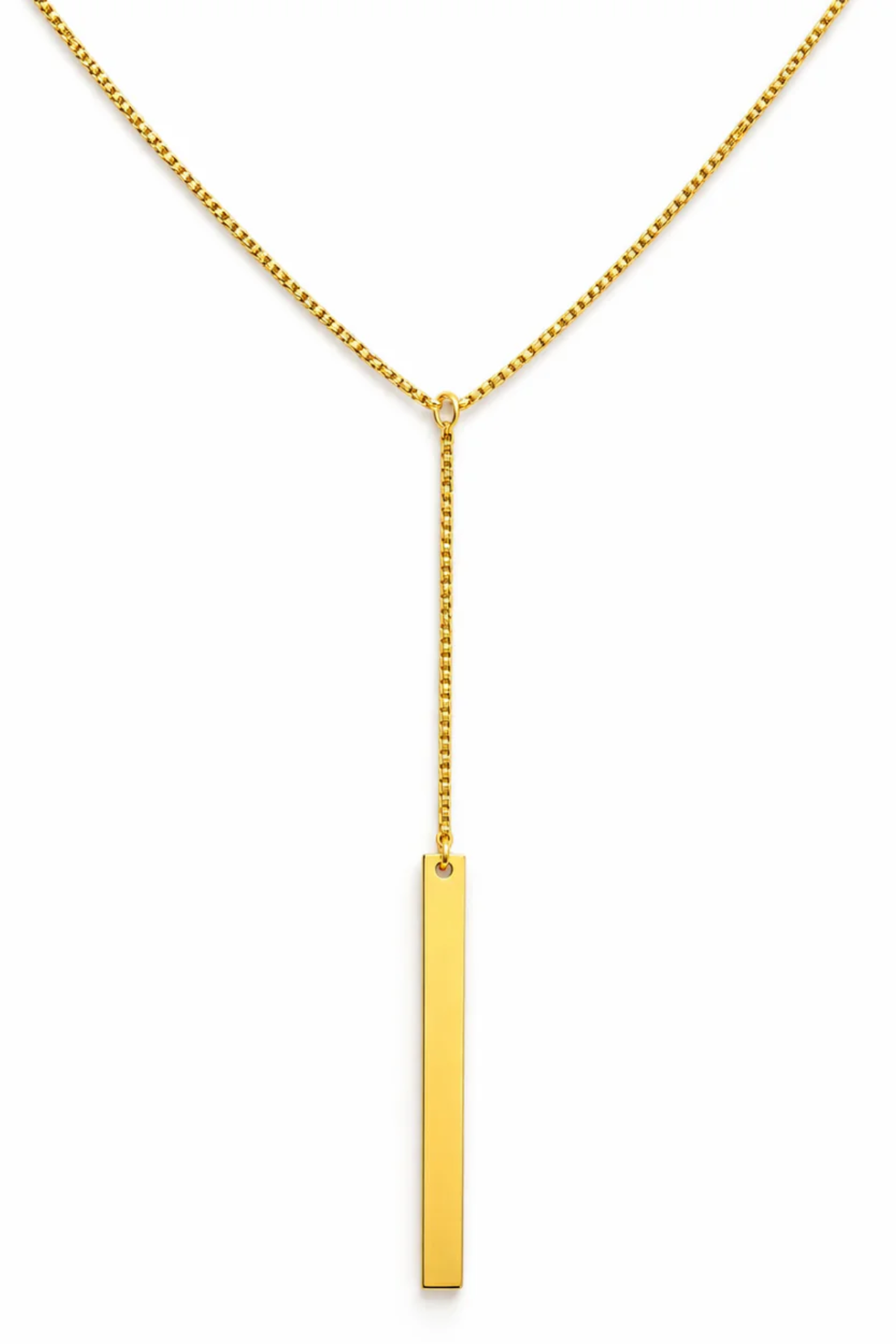 Gold necklace with a vertical bar pendant on a white background