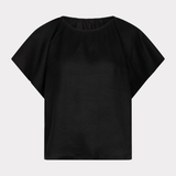 Black t-shirt on a light gray background