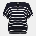 Black and white striped top on a light gray background