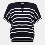 Black and white striped top on a light gray background