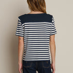 Striped short-sleeve tee with a relaxed fit, styled with denim