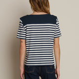 Striped short-sleeve tee with a relaxed fit, styled with denim