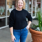 Minimal knit sweater with rolled edge detailing