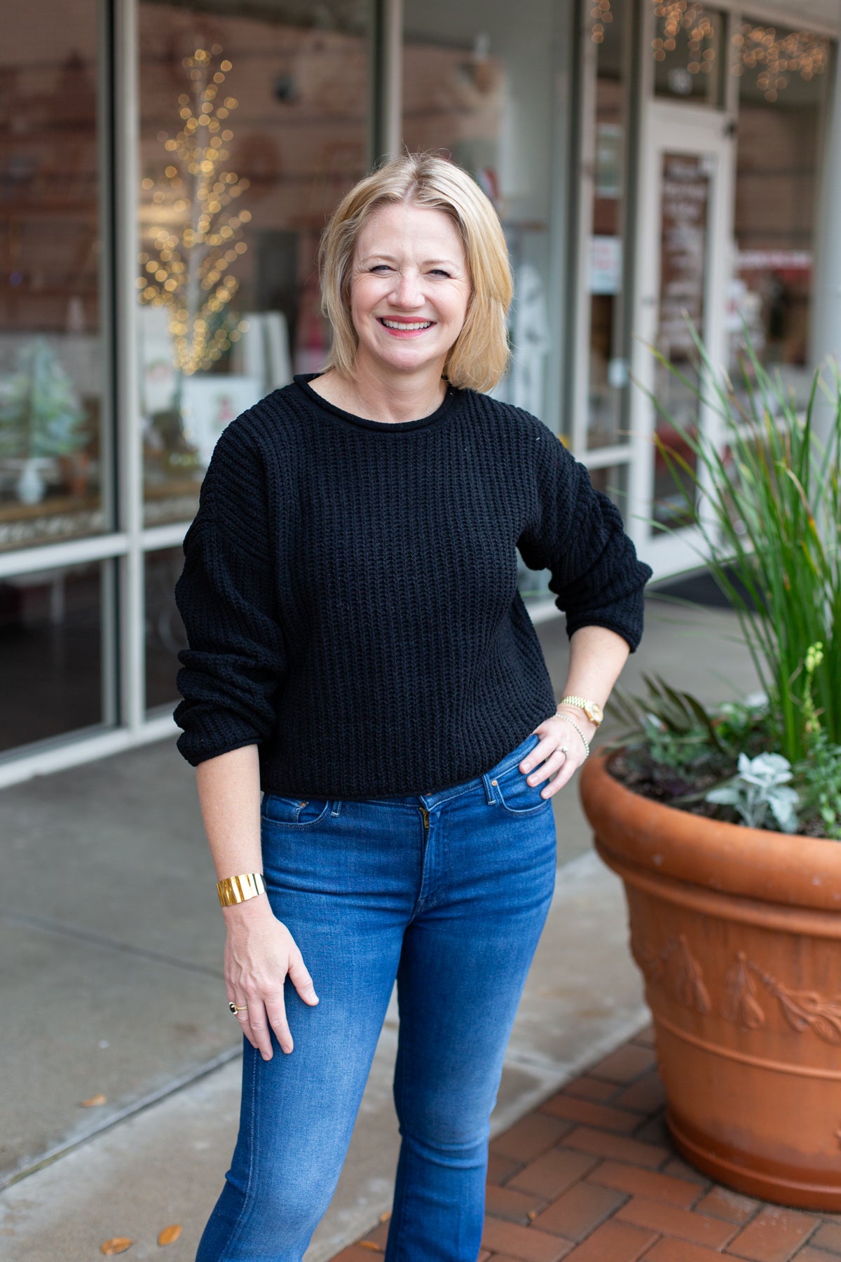 Minimal knit sweater with rolled edge detailing