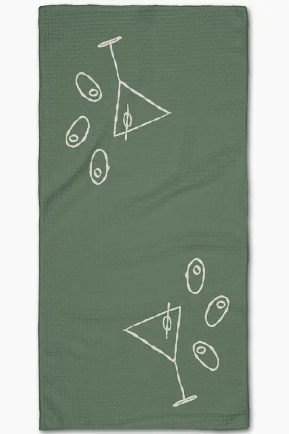 A sage green waffle-weave kitchen towel featuring white minimalist line-art drawings of martini glasses with olives, shown flat against a white background.