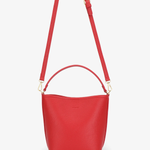 Red handbag with a strap on a white background