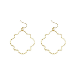 Gold hoop earrings on a white background