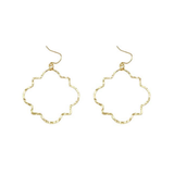 Gold hoop earrings on a white background