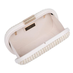 Beige clutch with pearl detailing on a white background