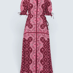 A long-sleeved maxi dress with puff sleeves and a front zipper, featuring a pink and deep magenta paisley and floral pattern, shown against a light gray background.