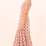 Printed midi dress with a flowing silhouette, styled for everyday wear.