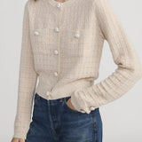 Check-pattern cardigan with subtle lurex shimmer, worn open over a neutral top