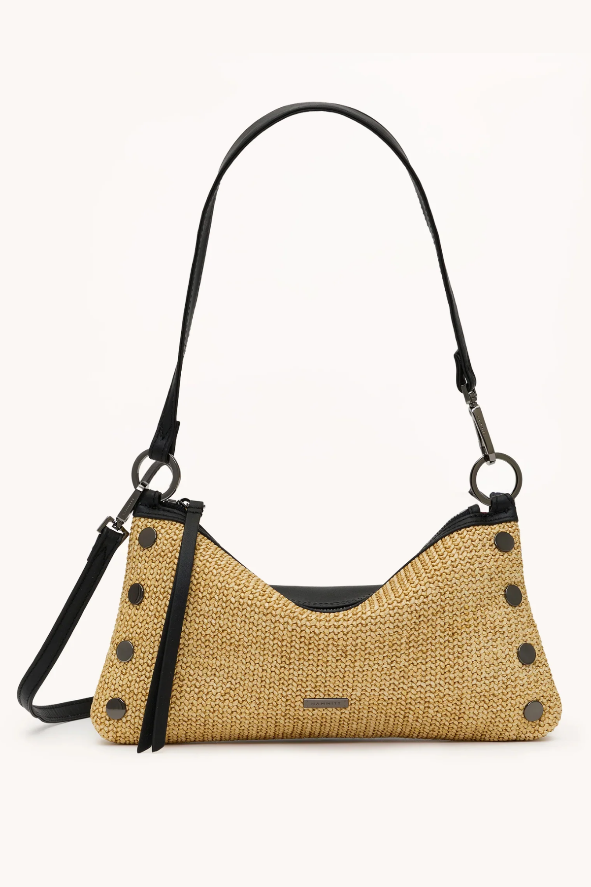 Woven handbag with black accents on a white background