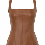 Brown faux leather top on a white background