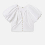 Blouse with dramatic voluminous sleeves styled with denim