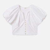 Blouse with dramatic voluminous sleeves styled with denim